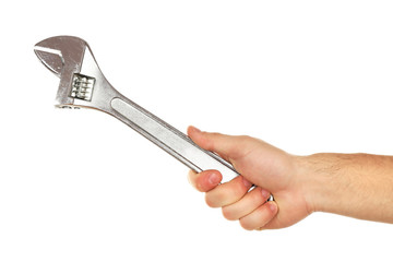 Adjustable wrench in male hand isolated on white