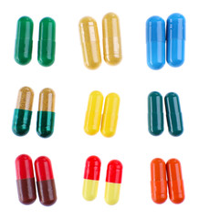 Different colorful pills isolated on white background