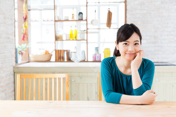 young asian woman in the kitchen