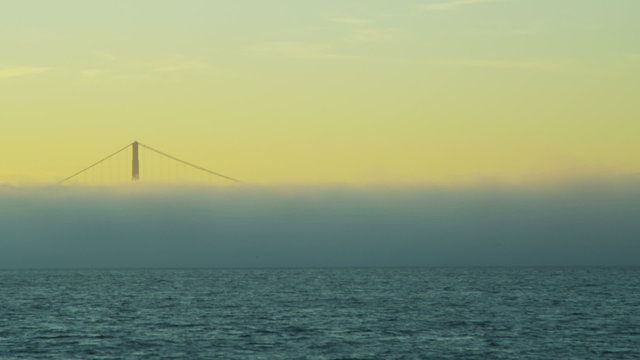 Sea fog sunset San Francisco Bay Golden Gate Bridge Tower, California, USA