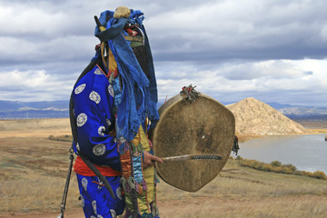 shaman performs a ritual