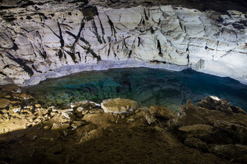. Kungur Ice Cave. Transparent greenish water in the lake