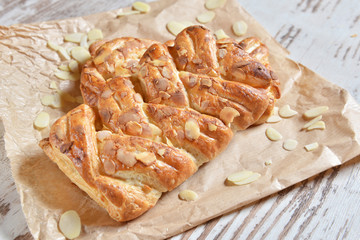 Homemade rolls with almonds petals