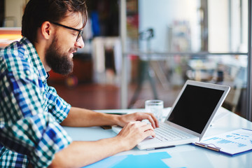 Young man typing