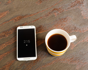 Cell phone and coffee cup