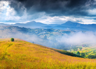 Summer landscape in the mountains before the storm