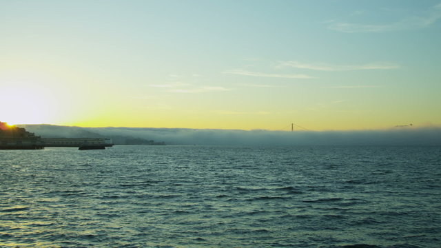 Sea fog sunset San Francisco Bay Golden Gate Bridge weather, coastline, California, USA