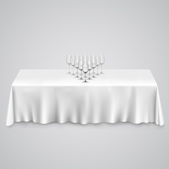 Table with a tablecloth glasses