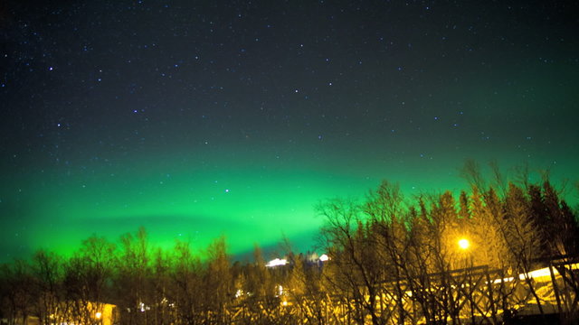 Time lapse Aurora Polaris illuminated sky natural solar wind Northern Lights Norway 