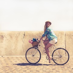 Fototapeta premium Cute blonde on a bike ride
