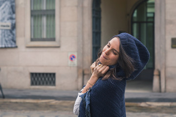 Beautiful girl posing in the city streets