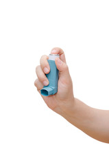 Woman hand holding asthma inhaler isolated on white background