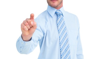 Businessman in shirt pointing with his finger