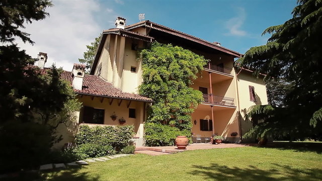 Italian villa with vineyard in summer