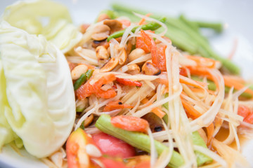 papaya salad or also known som tum is spicy thai cuisine