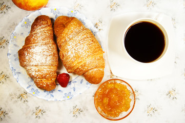 croissant and cup of coffee