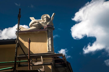 Obraz premium Small sculpture on the roof of the house in Lviv