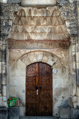 Doors portal of the old minaret in Crimea