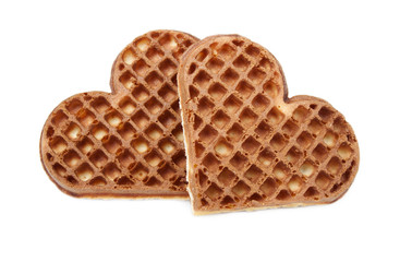 Waffle cookies in the form of hearts on a white background.
