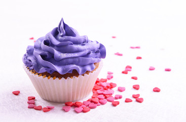 Delicious cupcake on table close-up