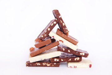 Pieces of chocolate on the table