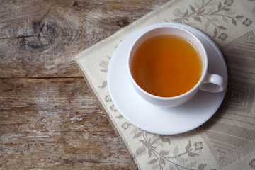 Cup of tea on wooden background