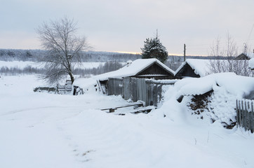 Fototapeta na wymiar Russian village in the winter