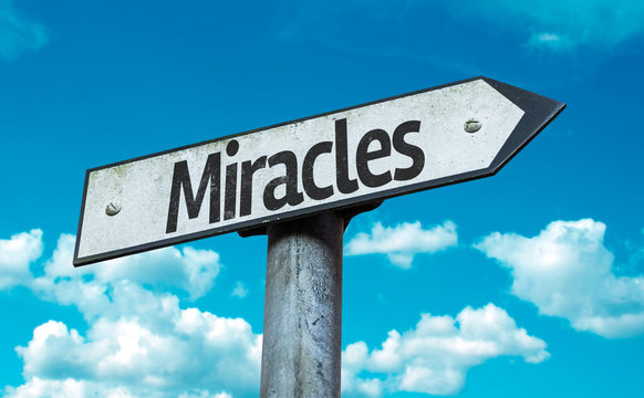 Miracles sign with sky background