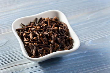 cloves on wooden table
