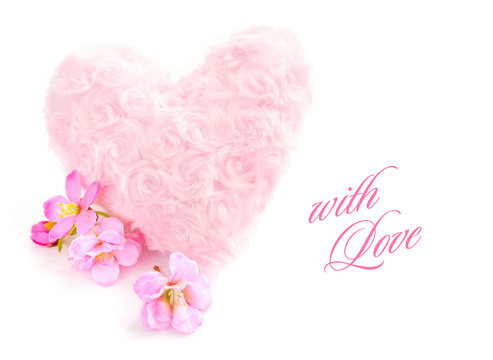 Fur pink heart with a pink flowers on white background