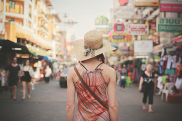 Young woman walking in Khao San, Bangkok