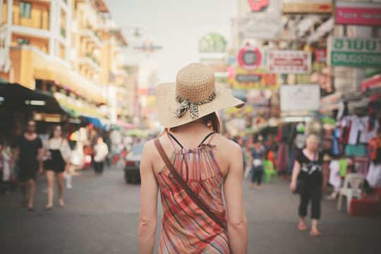 Young woman walking in Khao San, Bangkok