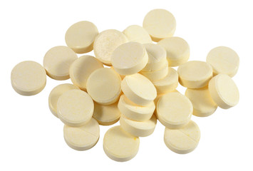 Fototapeta na wymiar Heap of pills on a white