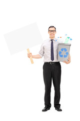 Man holding a recycle bin and a blank banner