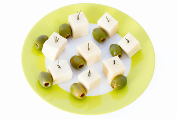 Cheese and olives with rosemary