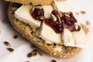 bread served with camembert and cranberry