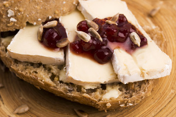 bread served with camembert and cranberry