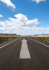 road with gray arrow