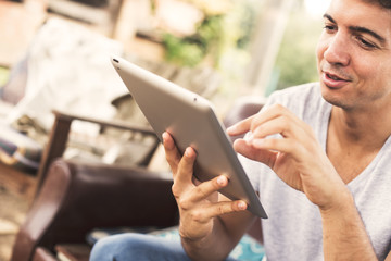 Young man using tablet