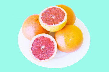 Delicious grapefruit on a white plate