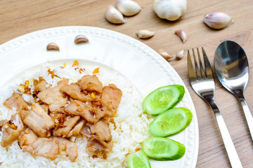 Fried pork with garlic and pepper on rice, Thai food style