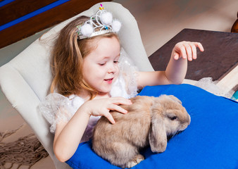 Little girl with rabbit