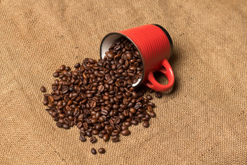 A cup with coffe beans