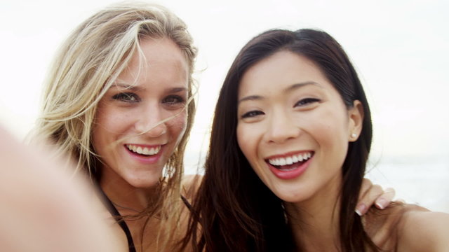 Close Up Young Asian Chinese Caucasian Girlfriends Smiling Filming Selfie