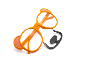closeup of a fake glasses, with bear shape isolated on white background
