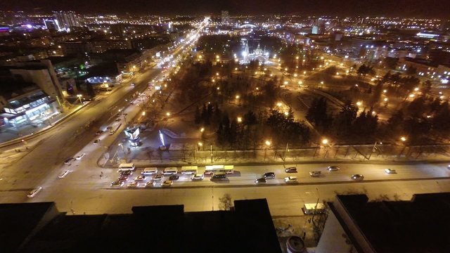Aerial shot of the city at night .