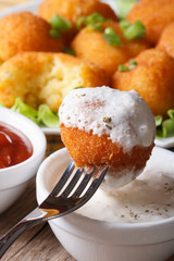 croquettes with sour cream  macro. vertical
