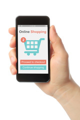 Hand holding smart phone with shopping concept