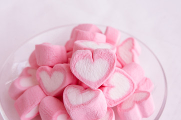 Pink heart marshmallow  in glass dish