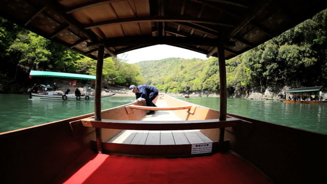 Riverboat Katsura River tourists travel Arashiyama Kyoto Japan Asia